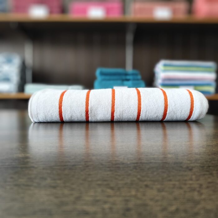 white towel - orange stripes